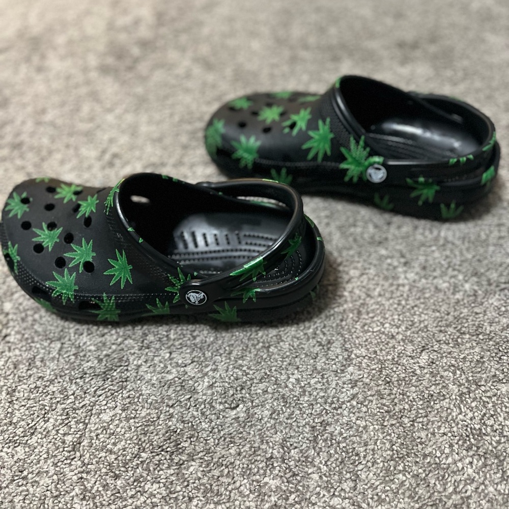 CROCS Black Clog Sandals with Green Leaf Print